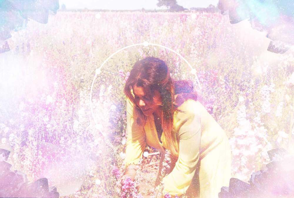 Flo in a field of flowers